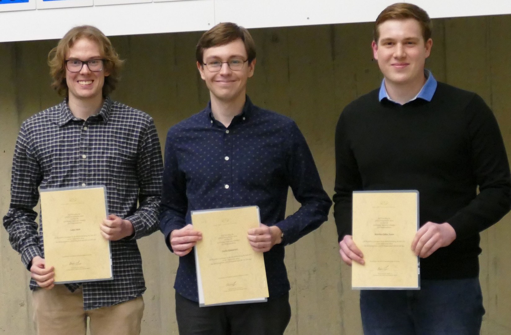 Matthias Julian Justen, Stefan Kemmerich and Lukas Mohr are honored for top academic performance