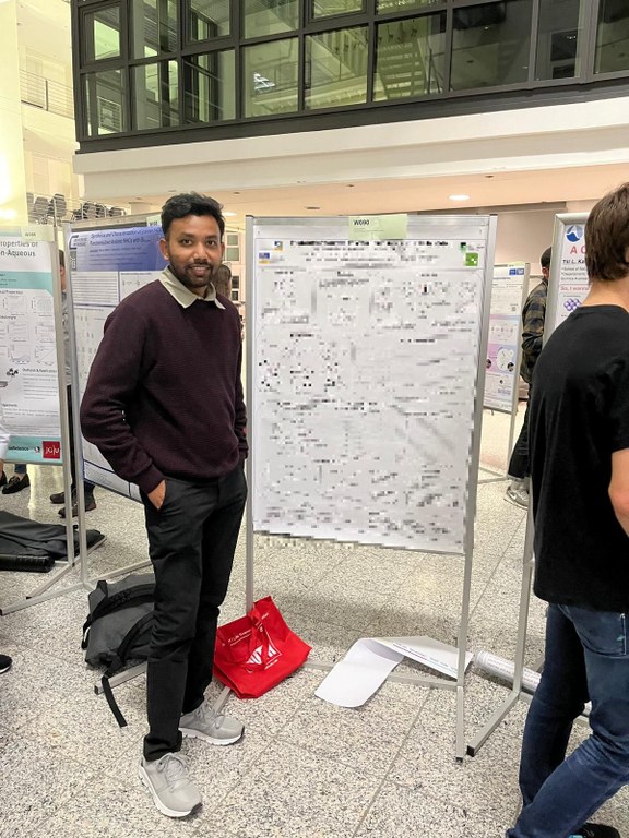 Sudip discussing in front of his poster. Sudip discussing in front of his poster.